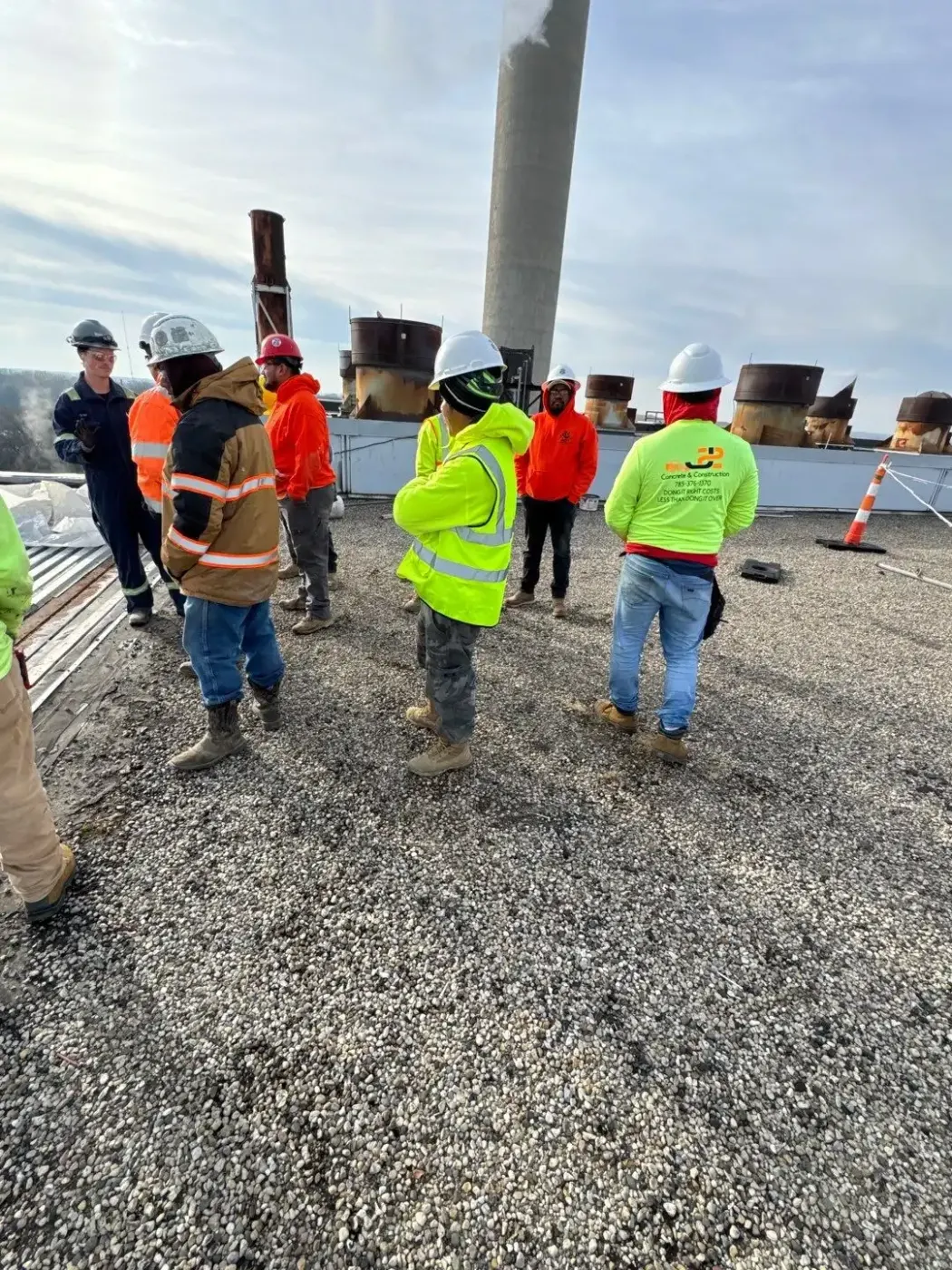 Tarping and dry-in on a Sheridan commercial roof