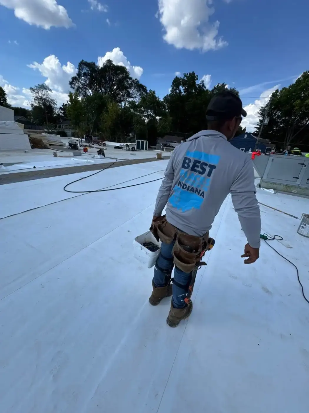 Tarping and dry-in on a Sheridan commercial roof